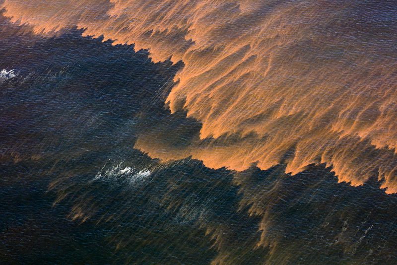 Orange sea photographed from above